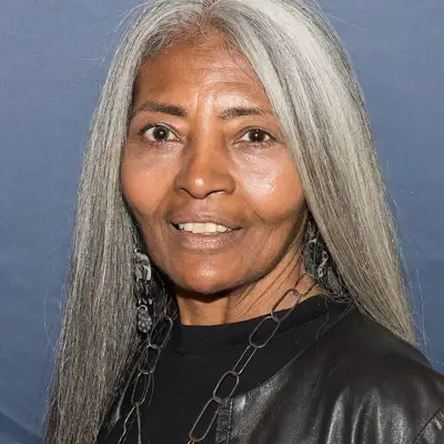 JoAni Johnson with straight gray hair