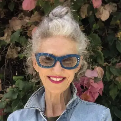 Linda Rodin with a gray topknot