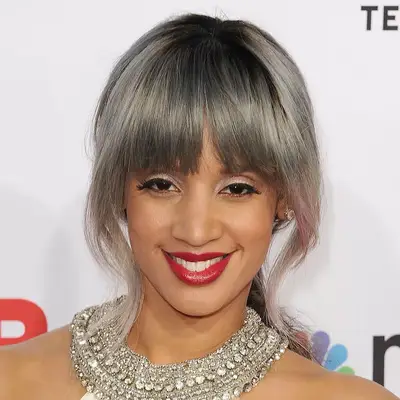 Dascha Polanco with a gray and pink hairstyle