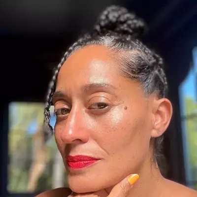 Tracee Ellis Ross with gray hairs showing