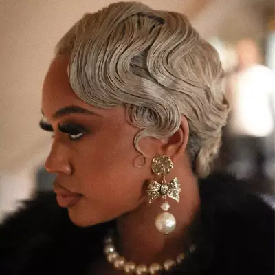 saweetie with gray finger waves