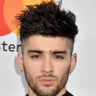 Zayn Malik wears a layered, tousled undercut