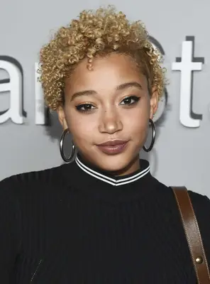 Amandla Stenberg with cropped blonde curls