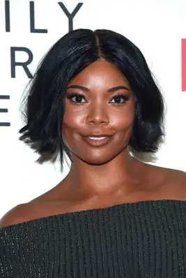 Gabrielle Union wearing a middle part wedge hairstyle