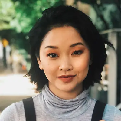 Lana Condor wears a tousled wedge bob haircut
