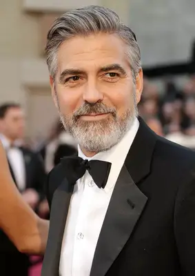 George Clooney with a salt-and-pepper beard at the 2013 Academy Awards in Hollywood, California