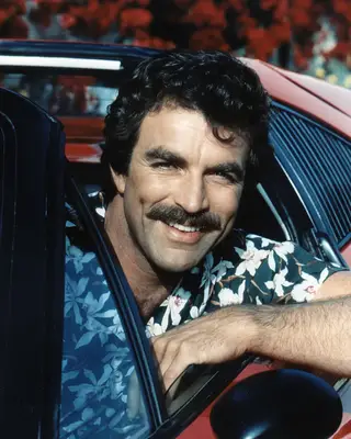 Tom Selleck with a clean shaven beard and a thick mustache on the set of 