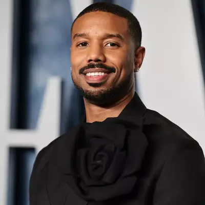 Michael B. Jordan with a beard and mustache at the 2023 Vanity Fair Oscar Party in Beverly Hills, California
