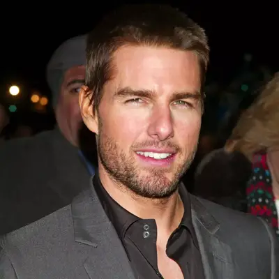 Tom Cruise with a sparse beard and mustache at the 2003 