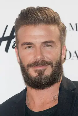 David Beckham with a full beard and mustache at the 2016 H&M Modern Essentials campaign in Los Angeles
