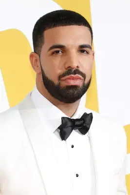 Drake with a groomed beard and mustache at the 2017 NBA Awards in New York City