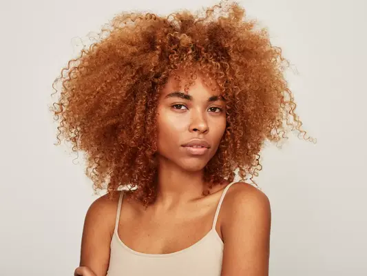 woman with curly ginger hair