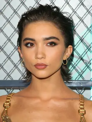Rowan Blanchard with messy, slicked-back hair