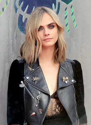 Cara Delevingne with broomstick blonde hair at the 2016 
