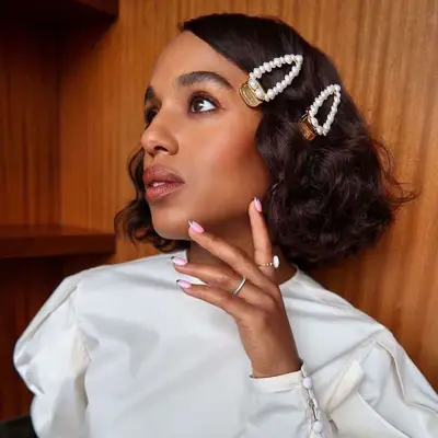 Kerry Washington with an accessorized side part bob