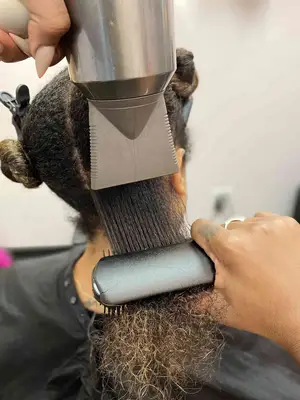 Blow dry the hair with a nozzle and brush 