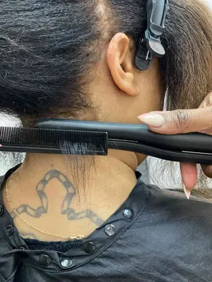 Use a small flat iron at the roots