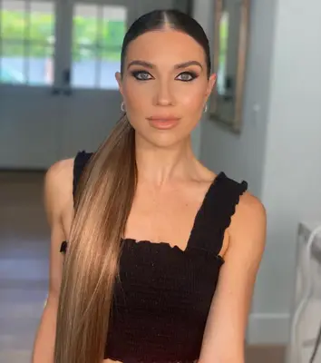 Middle-parted long, sleek ponytail