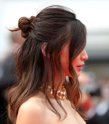 Gemma Chan half-up, half-down bun hairstyle