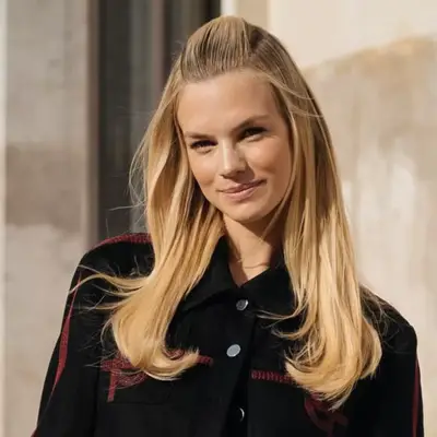 Nadine Leopold with a 2000s inspired pouf updo.