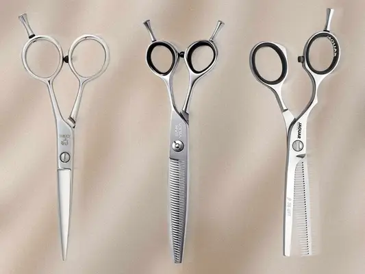 Side-by-side selection of professional hair shears, including Joewell, Sam Vila, and Jaguar, on a beige background