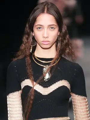 Crimped hair: model with crimped hair at Alexander McQueen autumn winter 2017