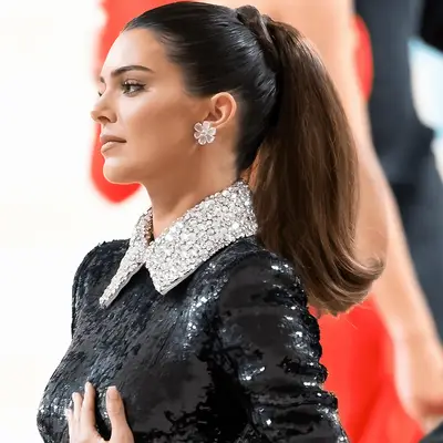 KENDALL JENNER AT the met gala wearing a bouncy ponytail
