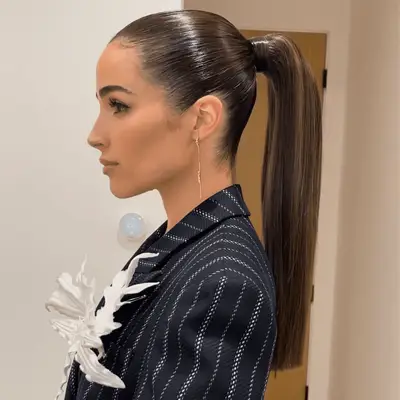 olivia culpo wearing a sleek ponytail
