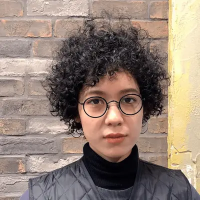 Modern Spiral Perms Tousled