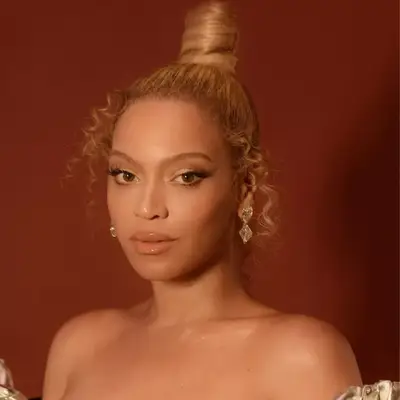 Beyonce with a sculptural top knot