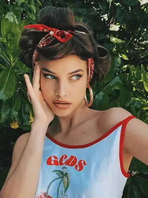 how to wear a headband: Adwoa Aboah wearing a bandana