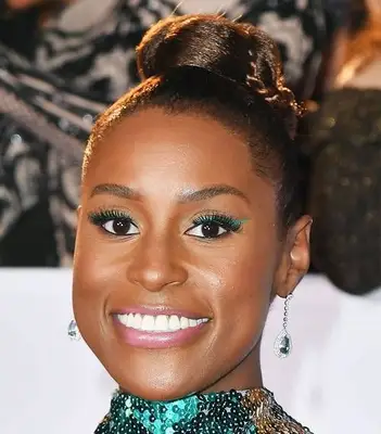 slimming topknot hairstyle with subtle braid