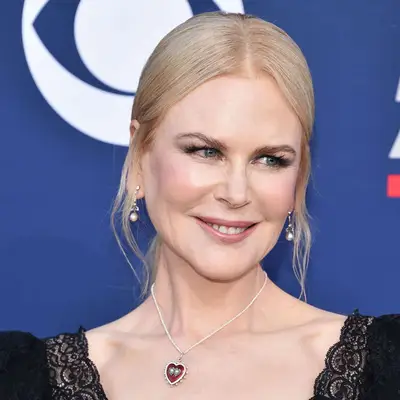 Nicole Kidman wears a low ponytail hairstyle with center part