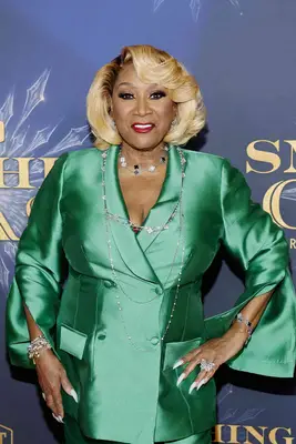 Patti LaBelle wearing a blond voluminous bob hairstyle