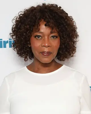 Alfre Woodard curly bob with bangs