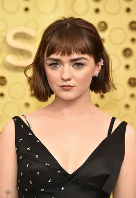 Maisie Williams with a short bob and full bangs at the 2019 Emmy Awards in Los Angeles