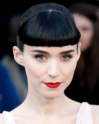 Rooney Mara with jet black baby bangs at the 2012 Academy Awards in Hollywood, California