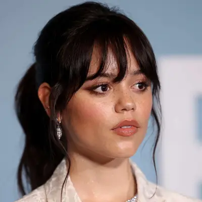 Jenne Ortega with a ponytail and full fringe at the 