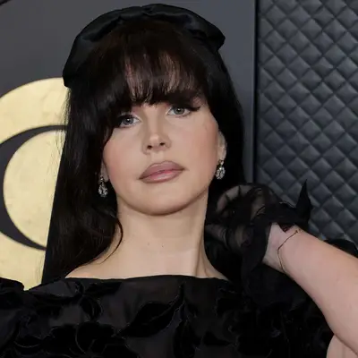 Lana Del Rey with long hair and retro-inspired bangs at the 2024 Grammy Awards in Los Angeles 