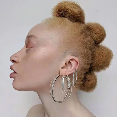 Medium-Length Hairstyles for Black Women Faux Hawk Mirian Njoh