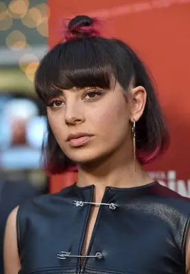 Half-up topknot with bangs