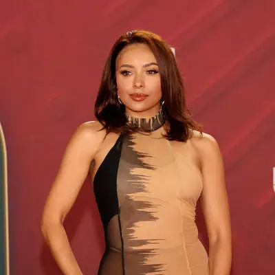 Actor Kat Graham with auburn hair at the Latin Grammy awards