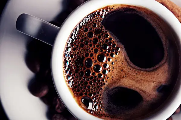 close up of coffee with bubbles