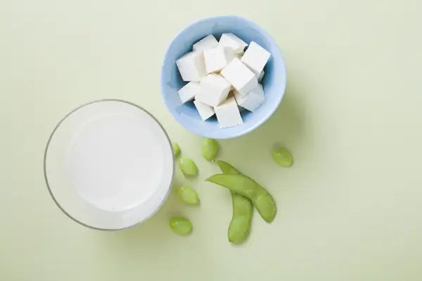 soy products on mint green backdrop
