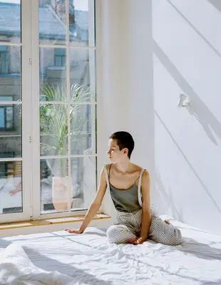 person relaxes at home