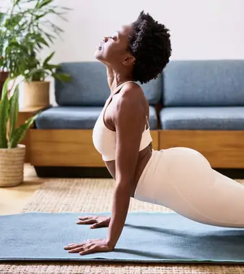 person doing yoga in the sun