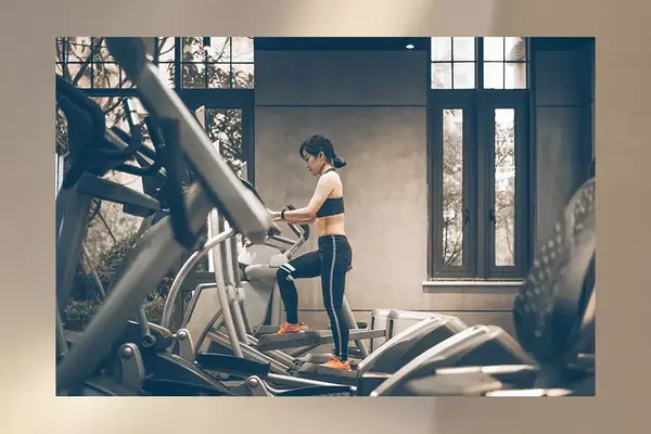 A woman working out on an elliptical 