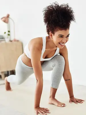 person does low lunge yoga