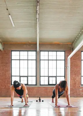 friends doing phalakasana blank yoga pose