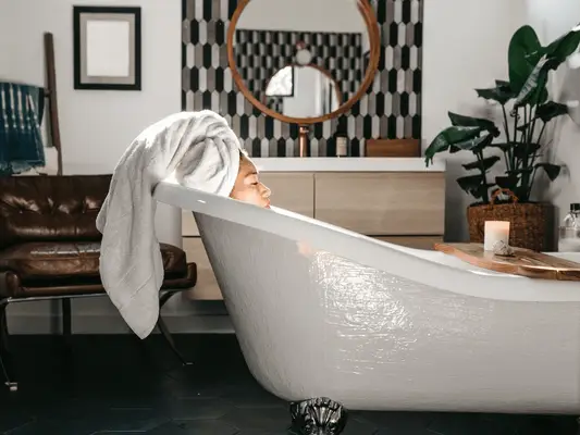 Woman relaxing in a bath